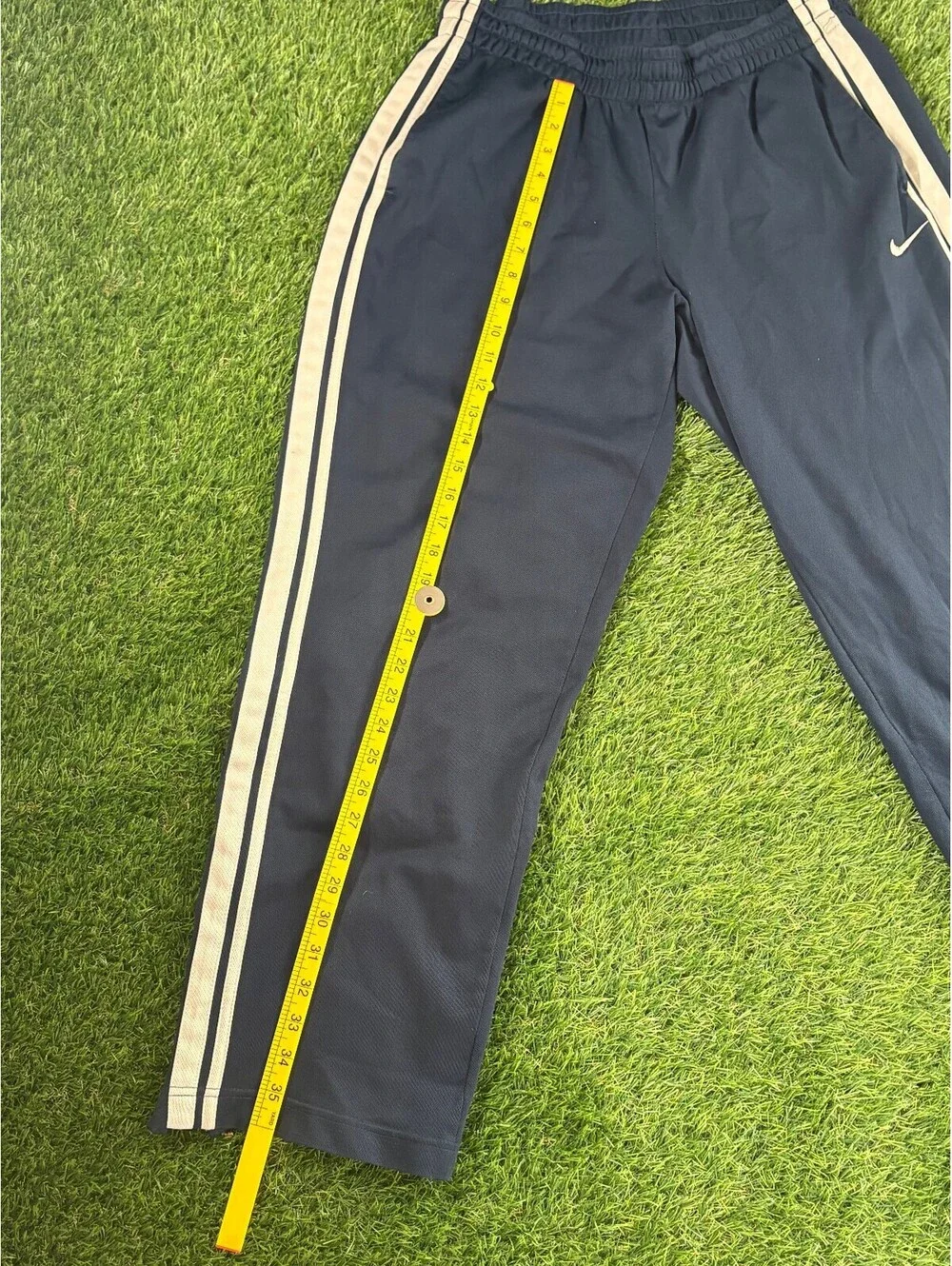 Vintage Nike 2000s navy polyester track pants, men's size M